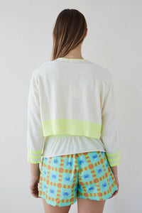 Cardigan corto piripi crudo
